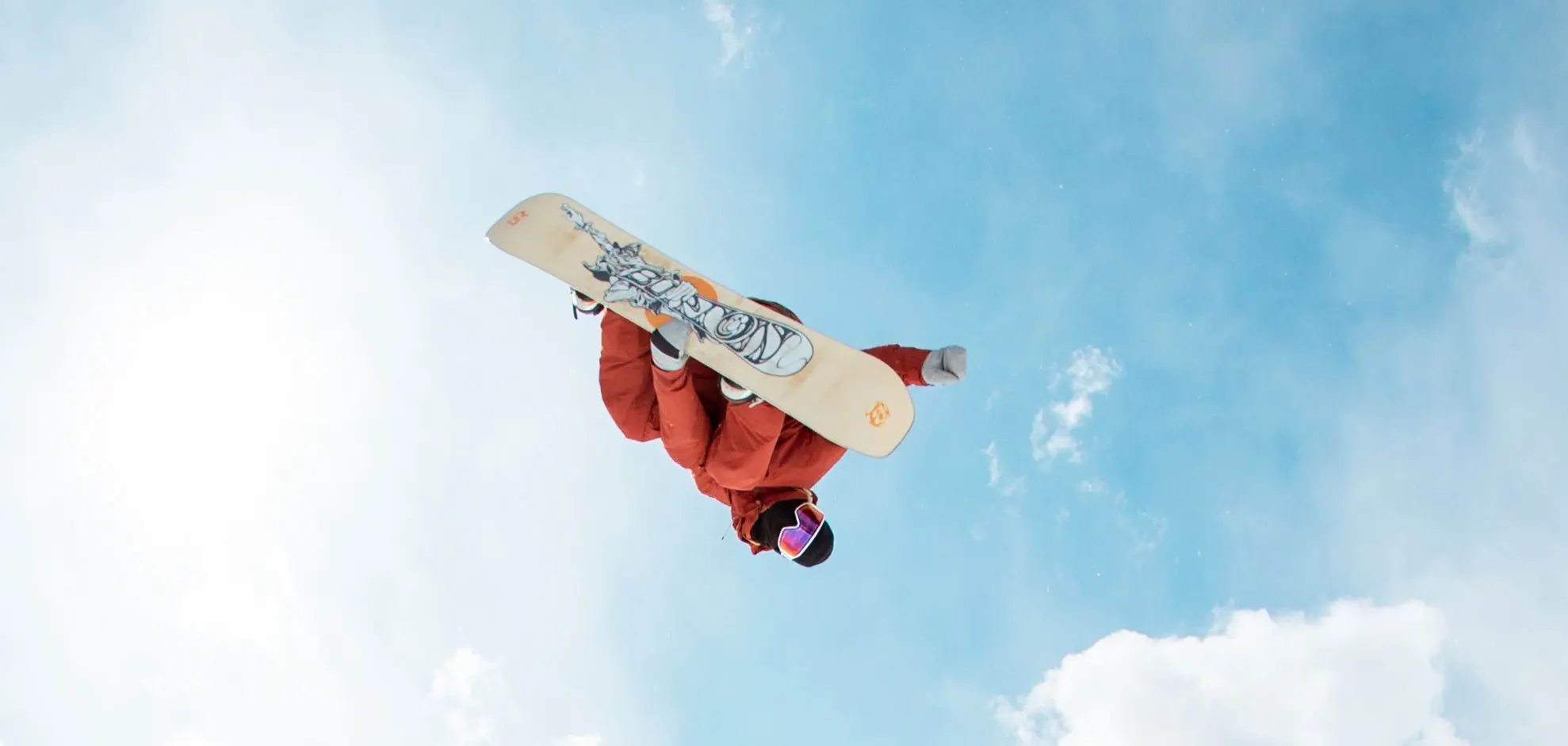 snowboarder goes off a jump